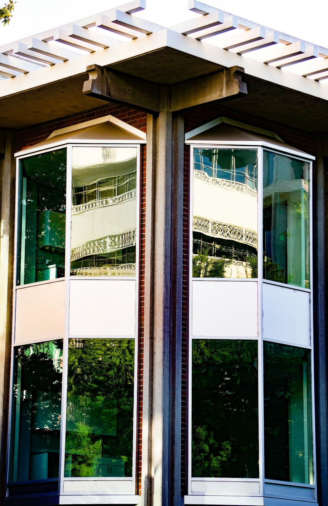 Modern community center building exterior with large windows