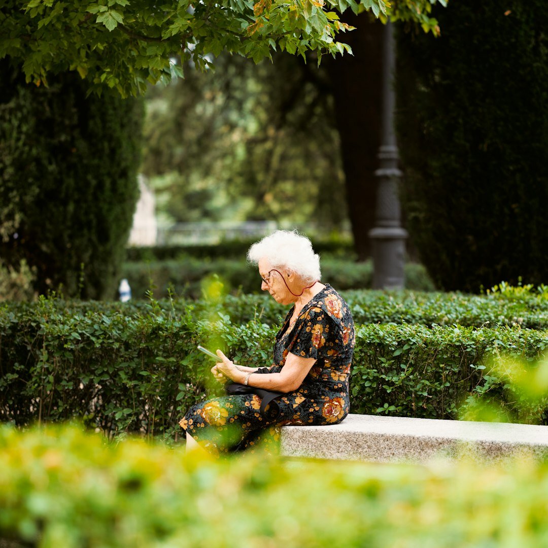 senior woman reading book